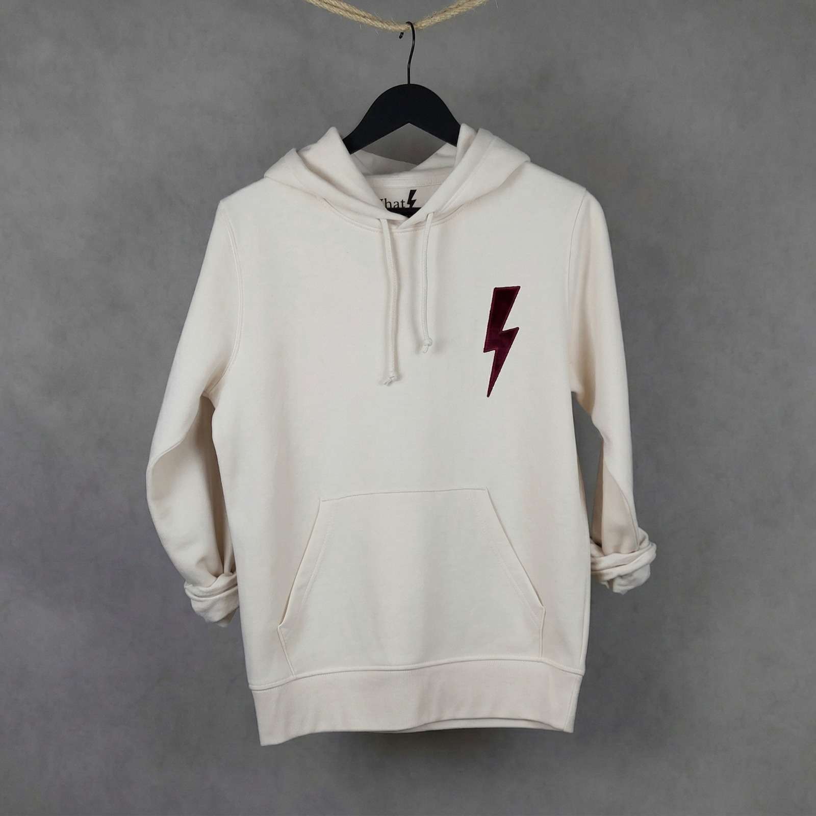 Sudadera premium de algodón orgánico WhatStyle con diseño Leader y logotipo oficial con rayo.